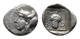 CILICIA. Soloi. Circa 465-400 BC. Obol.
Obv: Head of Amazon to left, wearing pointed cap with curved wing. 
Rev. Σ-O Grape bunch on vine. 
Göktürk 12....