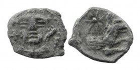 Lykaonia, Laranda AR Obol. Circa 324-323 BC. Obv: Facing head of Herakles, with club over shoulder; H to left.
Rev: Forepart of wolf to right; star a...