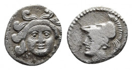 CILICIA. Uncertain mint. Ca. 4th century BC. AR obol.
Obv: Head of Gorgoneion facing, coiled snakes around.
Rev: Head of Athena left, with crested Cor...