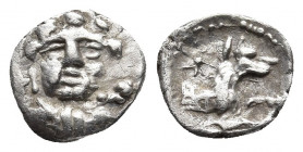 Lykaonia, Laranda AR Obol. Circa 324-323 BC. 
Obv: Facing head of Herakles, with club over shoulder; H to left.
Rev: Forepart of wolf to right; star a...