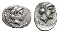 CILICIA. Nagidos. Circa 400-380 BC. Obol.
Obv: N Head of Aphrodite to right, hair in sphendone, wearing single pendant earring. 
Rev. Head of Dionysos...