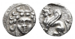 CILICIA. Mallos (?). Circa 375-340 BC. Obol.
Obv: Gorgoneion facing, wearing triple-pendant earrings. 
Rev: Sphinx seated to left. 
SNG Levante 250. S...