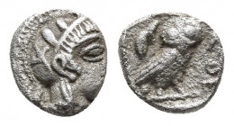 ATTICA. Athens. Obol (Circa 454-404 BC).
Obv: Helmeted head of Athena right.
Rev: AΘE. Owl standing right, head facing; olive sprig and crescent to le...