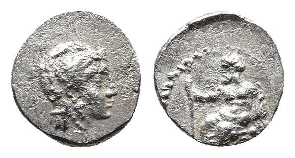 Cilicia, uncertain mint. AR Obol 
Obv: Baaltars seated left, holding lotus-tippe...