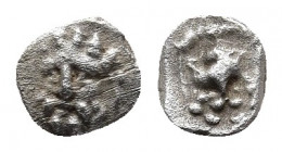 CILICIA, Isaura Palaia. Circa 333-322 BC. AR Tetartemorion.
Obv: Head of Herakles facing slightly left.
Rev: Facing lion’s head; YΛYΓC[Ω] below. 
Gökt...