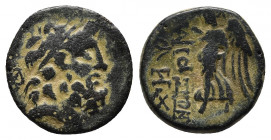 CILICIA. Elaioussa Sebaste. 1st century BC AE 
Obv: Laureate head of Zeus right; monogram left
Rev: EΛAIOYΣΣΙΩN - Nike advancing left, holding wreath ...