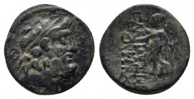 CILICIA. Elaioussa Sebaste. 1st century BC AE 
Obv: Laureate head of Zeus right; monogram left
Rev: EΛAIOYΣΣΙΩN - Nike advancing left, holding wreath ...