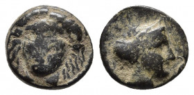 Caria, Iasos. 4th-3rd centuries B.C. AE.
Obv: Laureate head of Apollo facing slightly left.
Rev: IAΣI, head of nymph right, with hair in sakkos; crayf...