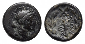 Lydia, Sardes Æ. 2nd-1st century BC. 
Obv: Laureate head of Apollo to left.
Rev: Club upwards within oak wreath, ΣAPΔIANΩN to either side, monogram ab...