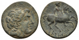 Uncertain king. 
Obv: laureate head to right (Ares or Apollo or the king?)
Rev: ΒΑΣΙΛΕΩΣ. Horseman galloping right, holding spear.
Uncertain reference...