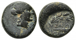 Lydia, Sardes Æ. 2nd-1st century BC. 
Obv: Laureate head of Apollo to left.
Rev: Club upwards within oak wreath, ΣAPΔIANΩN to either side, uncertain m...
