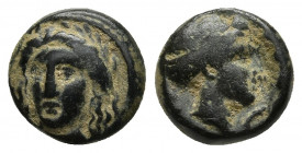 Caria, Iasos. 4th-3rd centuries B.C. AE.
Obv: Laureate head of Apollo facing slightly left.
Rev: IAΣI, head of nymph right, with hair in sakkos; crayf...