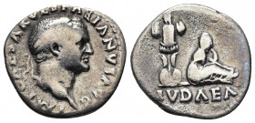 Vespasian. AD 69-79. AR Denarius.
Obv: "Judaea Capta" commemorative. Rome mint. Struck circa 21 December AD 69-early 70. Laureate head right.
Rev: IVD...