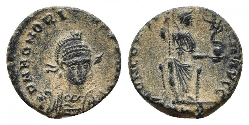 Honorius AD 393-423. Constantinople (?) Follis Æ. 
Obv: DN HONORIVS PF AVG, helm...