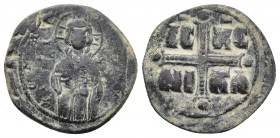 Michael IV the Paphlagonian (1034-1041) AE Nummi Constantinople Bronze.
Obv: Christ Antiphonetes standing facing, holding Gospels. 
Rev: IC-XC/ NI-KA ...