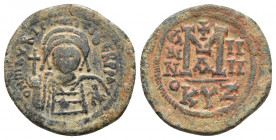 Maurice Tiberius AD 582-602. Cyzicuz. Follis Æ
Obv: D N mAVRICI TIbER P P A, helmeted and cuirassed bust facing, holding globus cruciger and shield.
R...