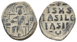 Time of Constantine IX, circa 1042-1055. Anonymous AE follis , Constantinopolis. 
Obv: Christ seated facing on square-backed throne. 
Rev: IS XS / bAS...