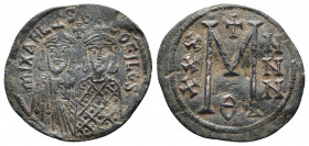 Michael II with Theophilus AD 820-829. Constantinople. Follis or 40 Nummi Æ
Obv: MIXAHL S ΘЄOFILOS, crowned facing busts of Michael and Theophilus, cr...