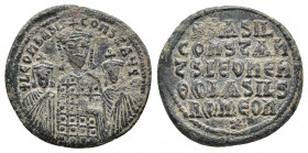 BASIL I THE MACEDONIAN, with LEO VI and CONSTANTINE (867-886). Follis. Constantinople.
Obv: + LЄOҺ ЬASIL S COҺST AЧGG. Crowned facing busts of Basil b...