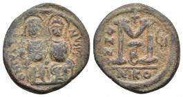 Justin II, with Sophia. 565-578. Æ Follis. Nicomedia mint, 2nd officina. Dated RY 6 (AD 570/1). 
Obv: Justin, holding globus cruciger, and Sophia, hol...