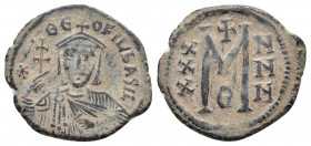 Theophilus AD 829-842. Constantinople. Follis or 40 Nummi Æ
Obv: ✷ • ΘЄO-FIL' ЬASIL', crowned and draped bust facing, holding patriarchal cross and ak...