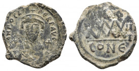 PHOCAS. 602-610 AD. Æ 40 Nummi. Constantinople mint. Dated year 3 (604/605 AD). 
Obv: d N FOCAS PERP AVC, crowned bust facing, wearing consular robes,...