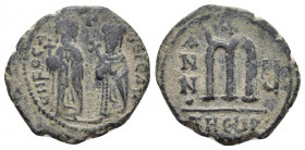 Phocas, with Leontia (602-610) AE follis, dated RY 5 (606/7). Antioch.
Obv: DN FOCA NE PE AV legend with Phocas on the left, holding cross on globe, a...
