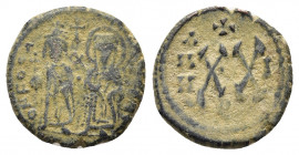 PHOCAS, with LEONTIA. 602-610 AD. Æ Half Follis. Antioch mint. Dated RY 1 (602/3 AD). 
Obv: ON FOCA NEPE AV, Phocas, holding globus cruciger, and Leon...