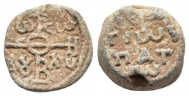 Byzantine PB Seal in the name of Myron(?), Hypatos. Eleventh(?) century AD. 
Obv: Invocative monogram for TW CW ΔΥ ΛW.
Rev: +MVPWN HVΠATW in four line...