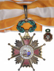 Cruz de cuello e Insignia de Comendador Ordinario. (1938-1975). Anv.: A LA LEALTAD ACRISOLADA. Rev.: FY sobre fondo azul. Orden de Isabel La Católica....