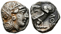 Athens , Attica. AR Tetradrachm, c. 440-420 BC.
Obv. Helmeted head of Athena right.
Rev. Owl standing right, head facing, olive sprig and crescent b...