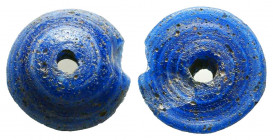 Ancient Roman Blue Glass Bead.
CIRCA 1st-4TH CENTURY A.D.
Reference:
Condition: Very Fine 



Weight: 7,6 gr
Diameter: 24,6 mm