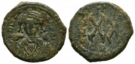 Maurice Tiberius. A.D. 582-602. AE follis. 

Reference:
Condition: Very Fine




Weight: 6,8 gr
Diameter: 23,6 mm