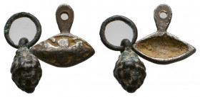 Ancient Roman Lot of 2 Pendants, c. 1st-3rd century AD. 
Reference:
Condition: Very Fine 



Weight: 
Diameter: