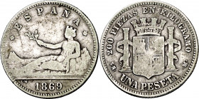 1869*----. Gobierno Provisional. SNM. 1 peseta. (AC. 17). ESPAÑA. Rara. 4,78 g. BC/BC-.