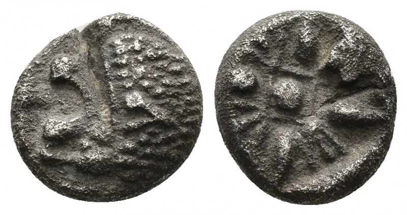 (Silver. 1.09 g. 9 mm) IONIA, Miletos. 600-550 BC. AR Obol
 Forepart of roaring...