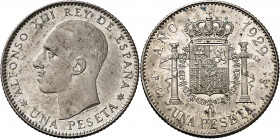 1929*1928. Alfonso XIII. PCS. 1 peseta. (AC. 76). Prueba no adoptada en plata. Firmado: M. MARTIN. Bella. Rarísima. 4,93 g. S/C-.