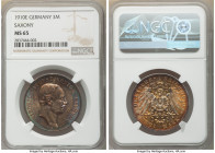 Saxony. Friedrich August III 3 Mark 1910-E MS65 NGC, Muldenhutten mint, KM1267. Toned a deep golden-orange with neon blue peripheries. 

HID09801242...