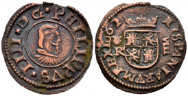 Philip IV (1621-1665). 8 maravedis. 1662. Coruña. R. (Cal-316). Ae. 1,57 g. Scallop on the left. Cleaned. VF. Est...25,00. 

Spanish Description: Fe...