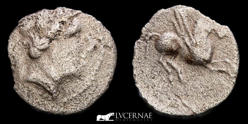 Hispania Antígua - Emporiton. Silver tritartemorion (0,36 g., 10 mm.) minted by ...