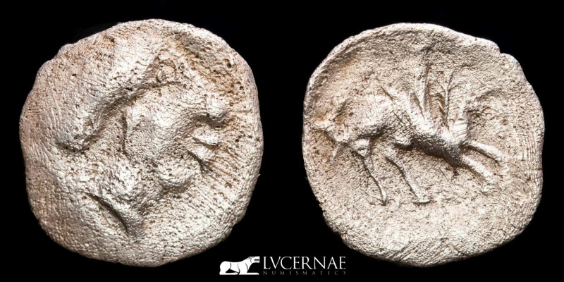 Hispania Antígua - Emporiton. Silver tritartemorion (0,32 g., 12 mm.) minted by ...