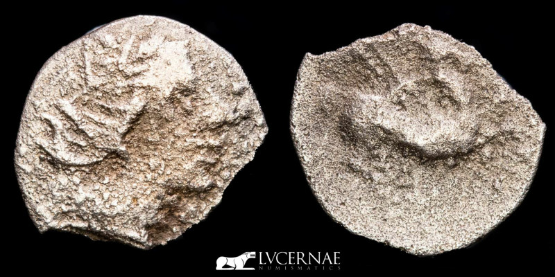Hispania Antígua - Emporiton. Silver tritartemorion (0,38 g., 10 mm.) minted by ...
