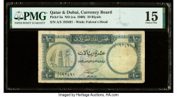 Qatar & Dubai Currency Board 10 Riyals ND (ca. 1960) Pick 3a PMG Choice Fine 15. Tape repairs are noted on this example.

HID09801242017

© 2020 Herit...