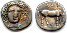 Greek
THESSALIE - LARISSA 400-344
Tête de la nymphe Larissa de trois-quarts de face, l’ampyx sur le
 front. 
R/. [Ω]. Cheval paissant. Ligne de ba...