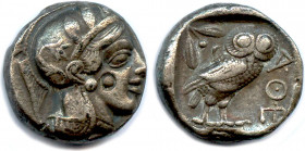 Greek
ATTIQUE - ATHÈNES 449-413
Tête d’Athéna à droite, l’oeil de face, coiffée du casque attique 
à cimier, orné de trois feuilles d’olivier et d’...