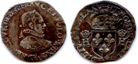 France Royales
HENRI III 1574-1589
HENRICVS III.D.G.FRANC.ET.POL.REX. Buste lauré et cuirassé 
du roi avec la grande fraise. Lettre d’atelier sous ...