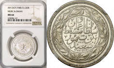 Emirate of Ajman
Muscat and Oman. Sa'id ibn Taimur. 1/2 Dhofari Rial AH 1367 (1948) NGC MS64 

Moneta do obiegu w prowincji Dhofar.Pełne lustro men...