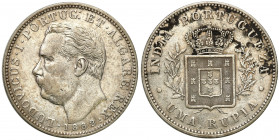 Portugal
Portuguese India. 1 rupee 1882 

Patyna.KM 11

Details: 11,61 g Ag 
Condition: 3 (VF)