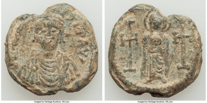 Heraclius (AD 610-641). Lead seal (26mm, 18.15 gm, 12h). VF. AD 610-613. d N hЄR...