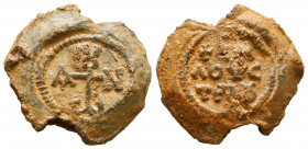 Byzantine lead seal of 
 Ioannes (John) illoustrious
(6th cent.)
Obv.: Cruciform monogram, ΙΩΑΝΝΟΥ (Of John), wreath border.

Rev.: Inscription in 3 l...